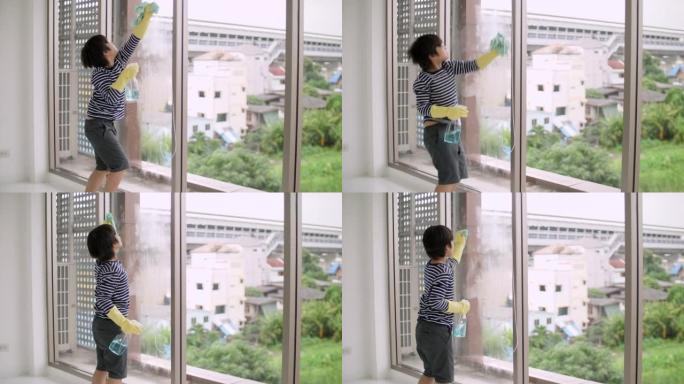 男孩用海绵洗窗户玻璃，为父亲伸出援助之手