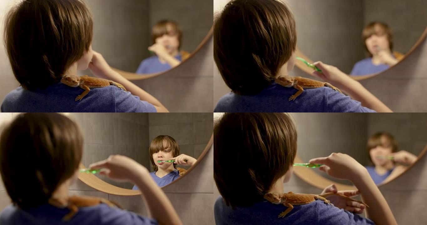 男孩在浴室刷牙时抚摸着他的橙色蜥蜴