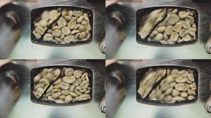 特写镜头看到许多开胃的小咖啡豆在花名册中四处移动，在那里油炸，会得到美妙的咖啡味道