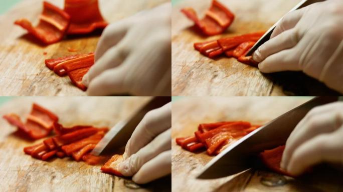 厨师的手切成新鲜的甜红甜椒。墨西哥玉米饼的制作过程。延时