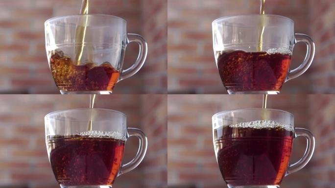 将新鲜蒸红茶倒入室外的透明玻璃杯中