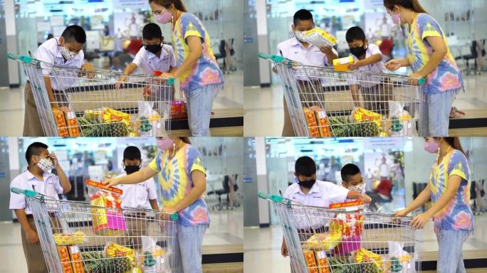 母亲和孩子在超市购物。