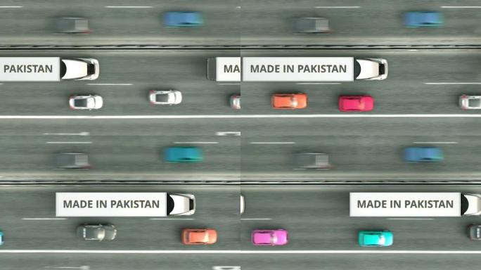 半挂卡车的空中俯视图，巴基斯坦制造文本沿着道路行驶。巴基斯坦商业相关可循环3D动画