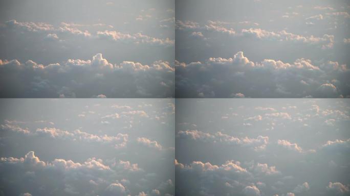 日出时飞越云层，从飞机驾驶舱看