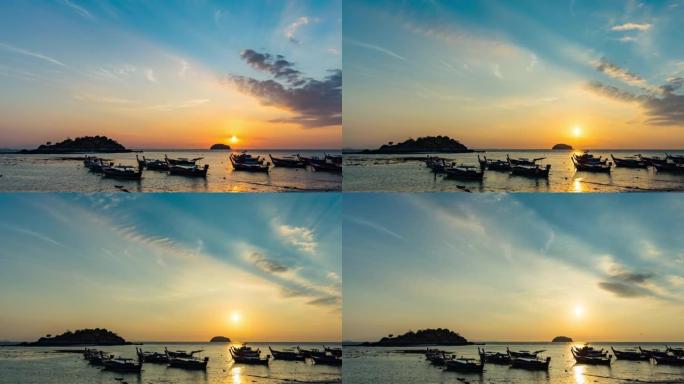 黄昏日落时渔船的轮廓，阳光反射和戏剧性的云彩