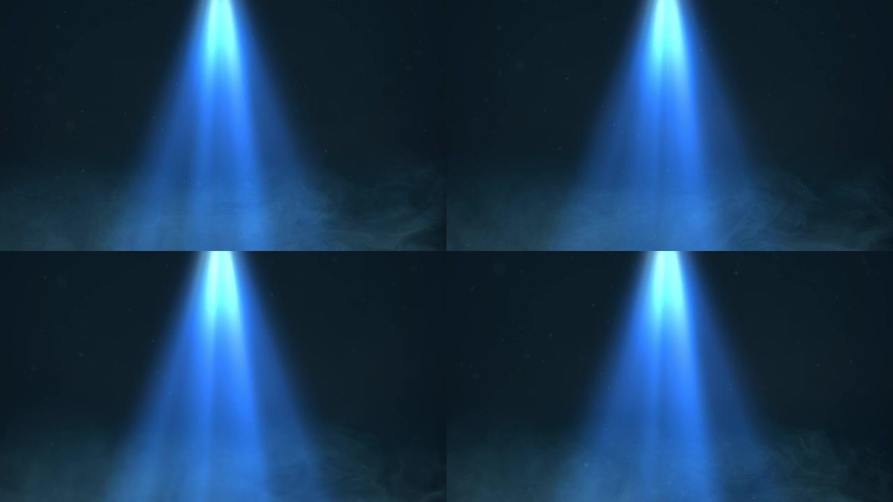 定向聚光灯光束通过烟雾和粒子发出蓝色。