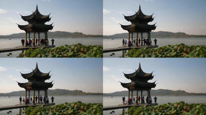 晴天时间杭州市著名的西湖码头海湾宝塔慢动作全景4k中国