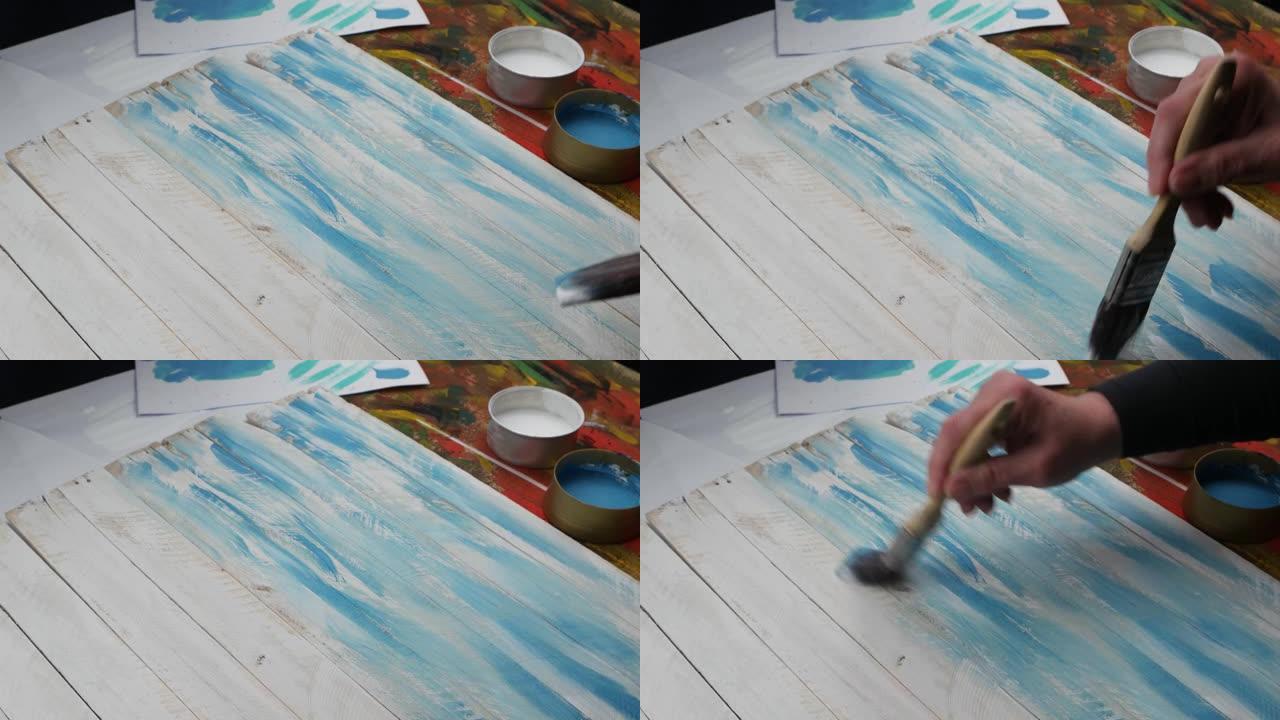 用白色和绿松石油漆画木板