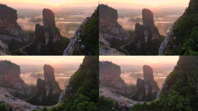 宋卡府考库哈的延时日出场景。有绿色林木的山。泰国的自然景观背景