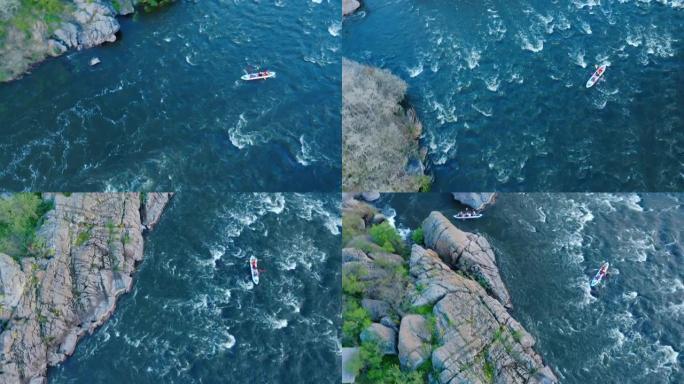 一艘皮划艇在石头岩石之间高速奔流的河流上的鸟瞰图。
