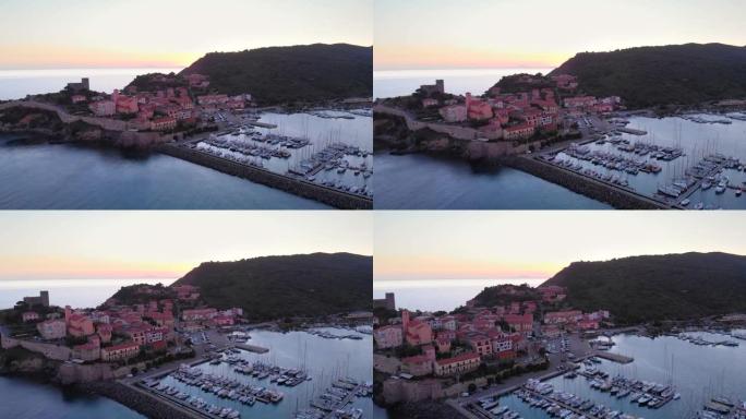 日落时分，来自意大利海城塔拉莫内的游艇港