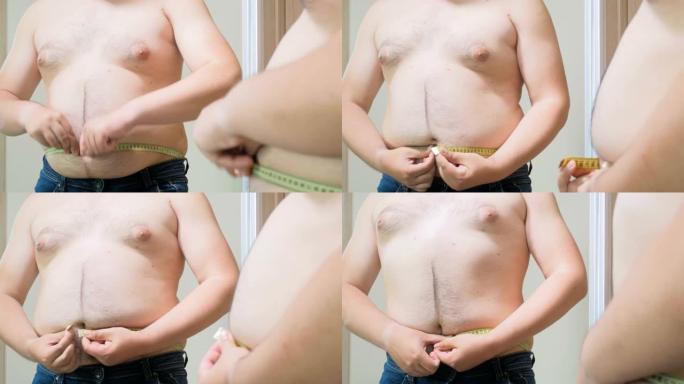 4k特写视频肥胖男子在镜子上测量大胃