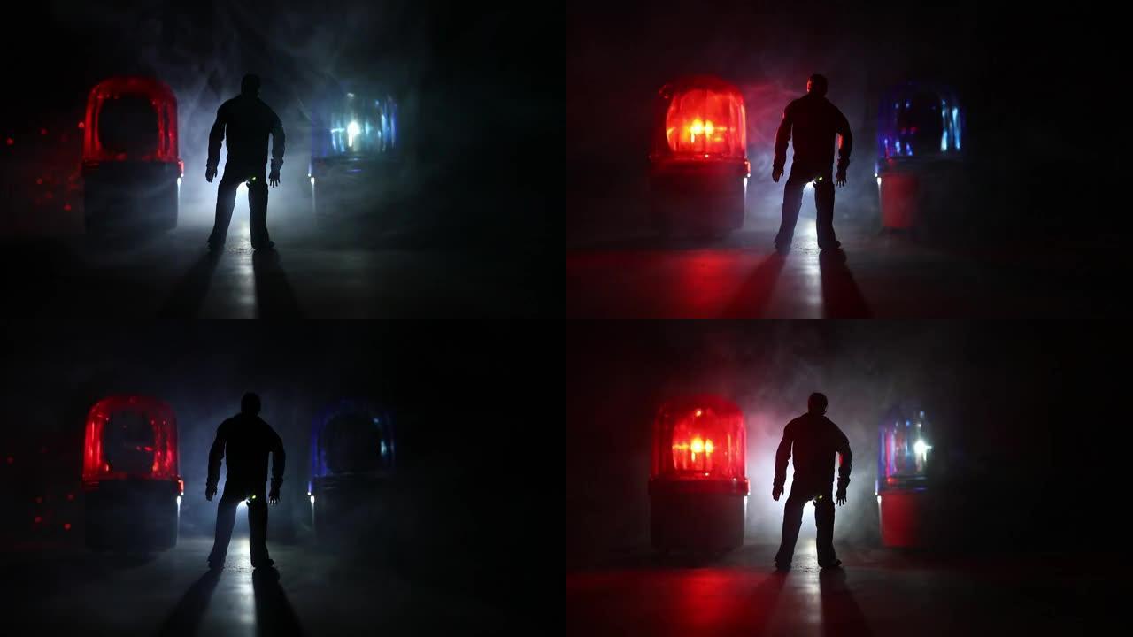 法律或犯罪概念。在一个有雾的夜晚，一个人独自站在路中间。带有手铐，正义雕像和正义槌的艺术品装饰，色调