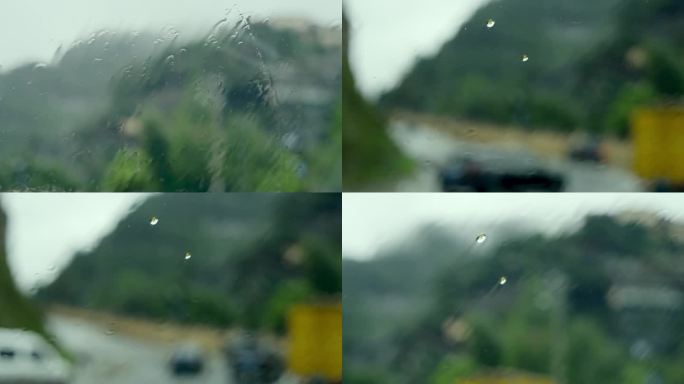 玻璃窗雨水水滴下雨