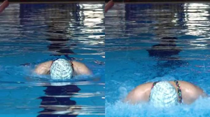游泳女子在游泳池游泳-垂直视频