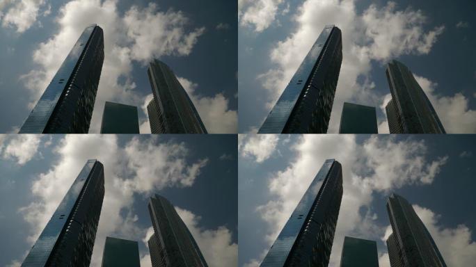 阳光灿烂的一天新加坡市中心办公室摩天大楼正面观看慢动作全景4k