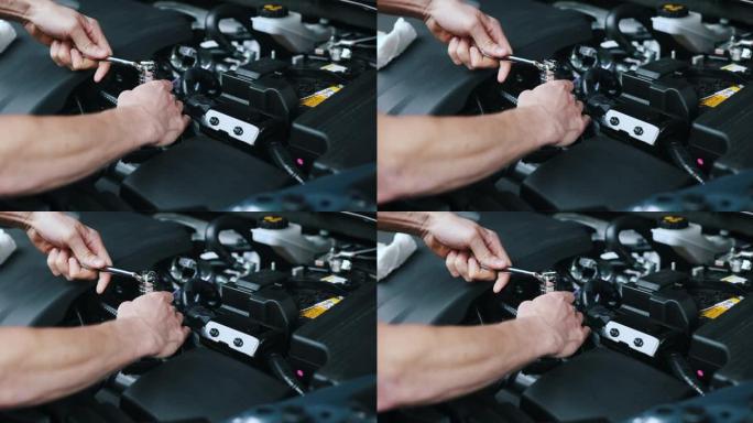 汽车维修用扳手加工汽车发动机的汽车修理工。维护和修理