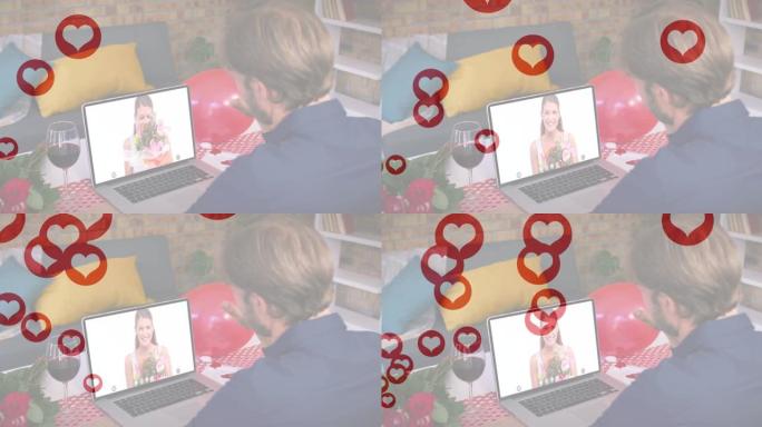 在笔记本电脑上进行视频通话时，漂浮在白人男子上方的多个红心图标