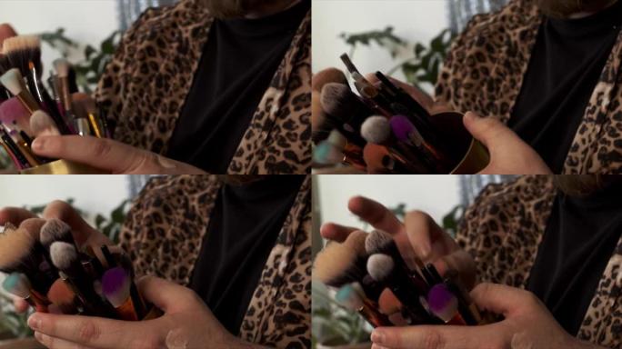 一个无法识别的化妆师选择使用哪种化妆刷的4k视频片段