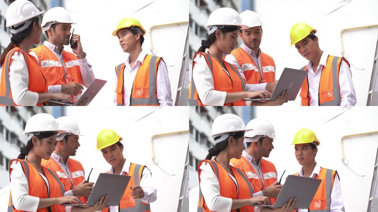 工程师开会检查。员工与团队一起检查和检查。男工程师在安全套内为亚洲男女提供一些建议。