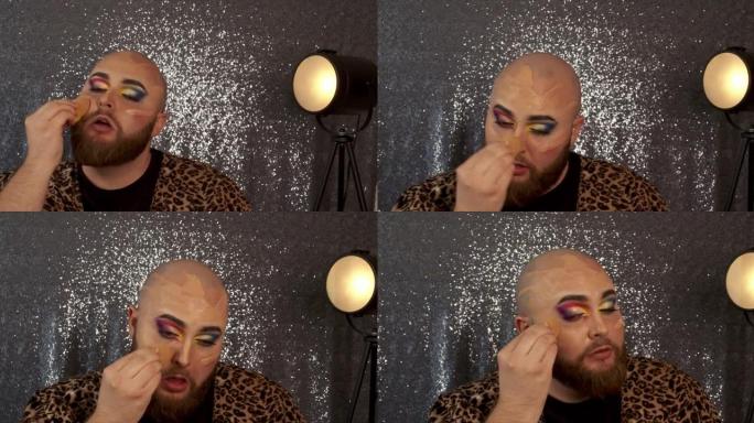 一名男性化妆师使用海绵混合粉底的4k视频片段