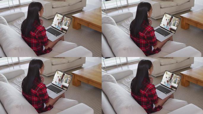 非裔美国女教师在家里的笔记本电脑上与男大学生进行视频通话