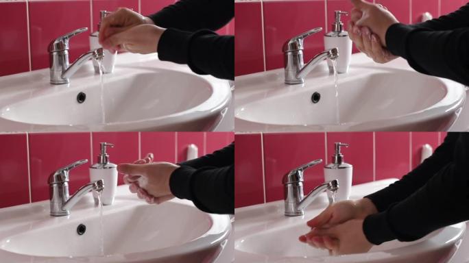 男人用肥皂洗手。健康与美容理念