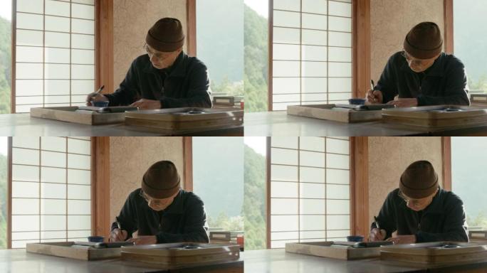 MS-资深日本艺术家在他的工作室里写作