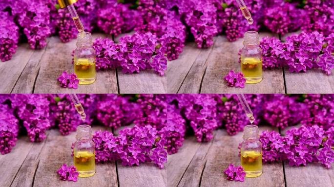 紫丁香精油和提取物在一个小瓶。选择性聚焦。自然。