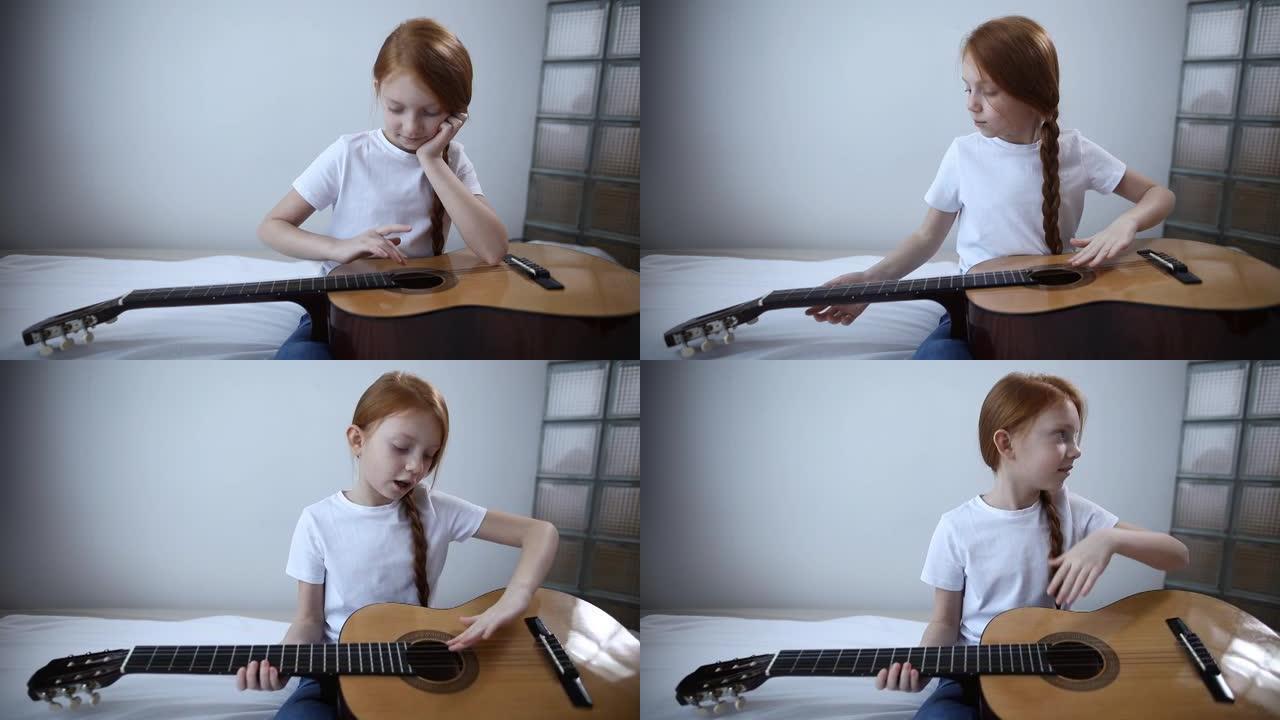 红发博主女孩在相机上弹吉他。一个自学成才的女孩喜欢在她的视频博客上让订阅者感兴趣
