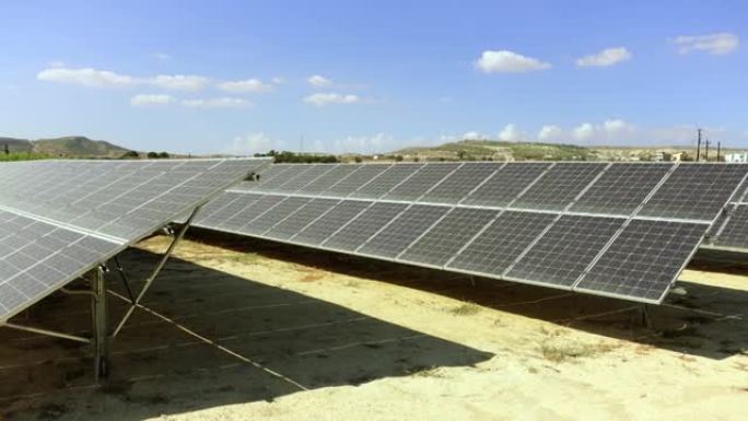 野外尘土飞扬的太阳能电池板。绿色自然能源收集。环保电源