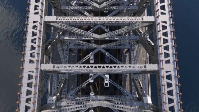 从钢结构悬索桥上方俯瞰下方移动的交通