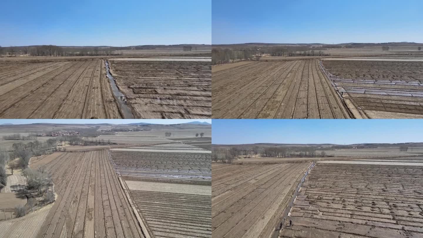 农民抽水浇地灌溉农田航拍