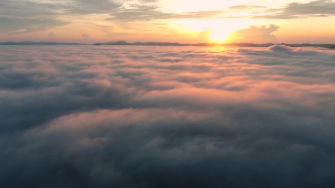 风景优美的空中无人机俯视图山脉美丽的日出雨林日出时有雾和薄雾，乐山，萨道，宋卡