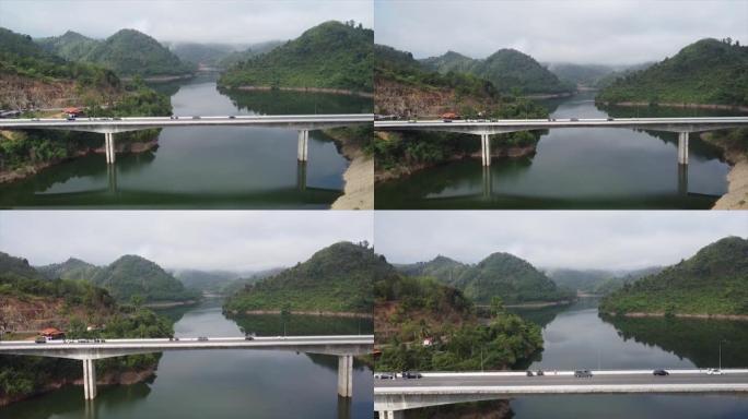 无人驾驶飞机在泰国南部的水库或河流上的高角度视图桥。雅拉省邦朗大坝上的桥路