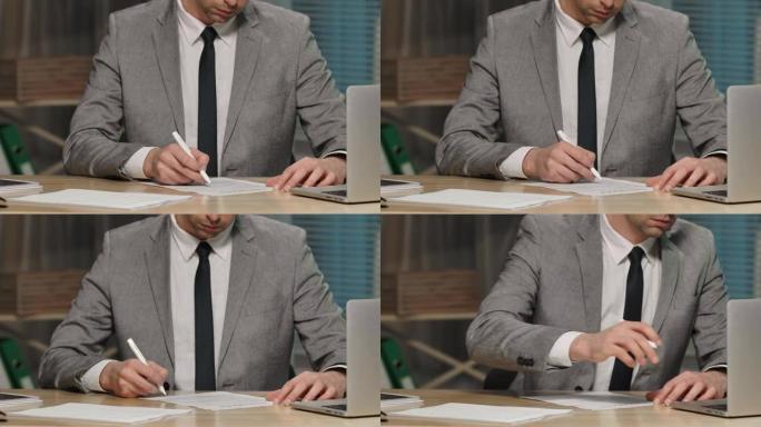 商人用钢笔合同检查和签字。穿着西装的老板坐在办公室的桌子旁。签署文件、协议或交易、批准伙伴关系。特写