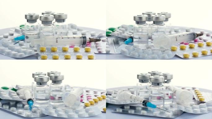 病毒covid 19的各种药物，注射器和疫苗小瓶，白色背景旋转360度，4k
