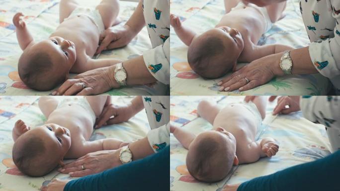 婴儿在新型冠状病毒肺炎大流行的儿科医生办公室。医生为新生儿接种疫苗，特写。