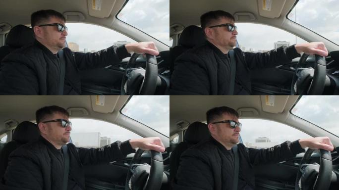 白天驾驶汽车的人的观点，手在方向盘上，宽镜头