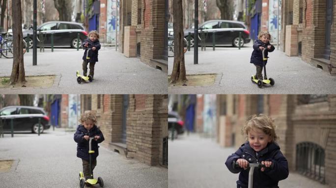 在城市人行道上骑三轮踏板车的男婴