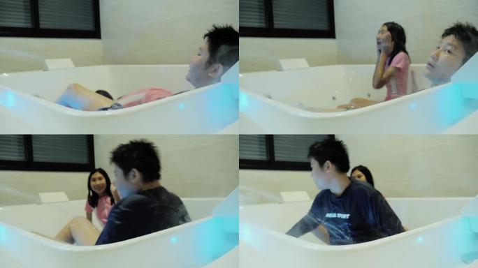 快乐的亚洲儿童在度假期间在酒店房间里一起在热水浴缸里有新的体验，生活方式理念。
