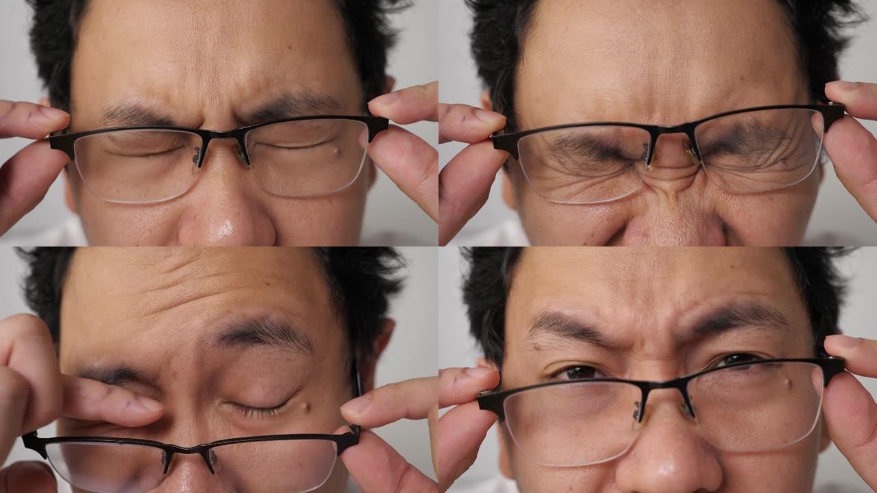 一个戴着眼镜的男人检查他的视力，模糊视力问题