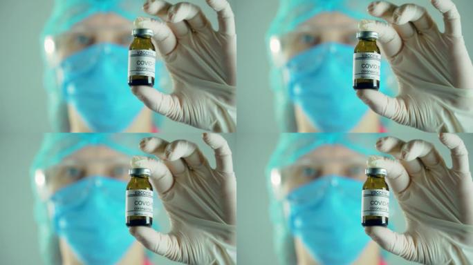 医生微生物学家病毒学研究人员在实验室戴着防护口罩和手套拿着安瓿注射疫苗