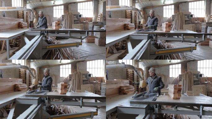 木匠在自己的木工店里工作。他在锯木厂工作。小企业概念