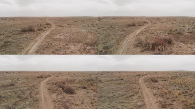 哈萨克斯坦沙漠中的乡间小路鸟瞰图