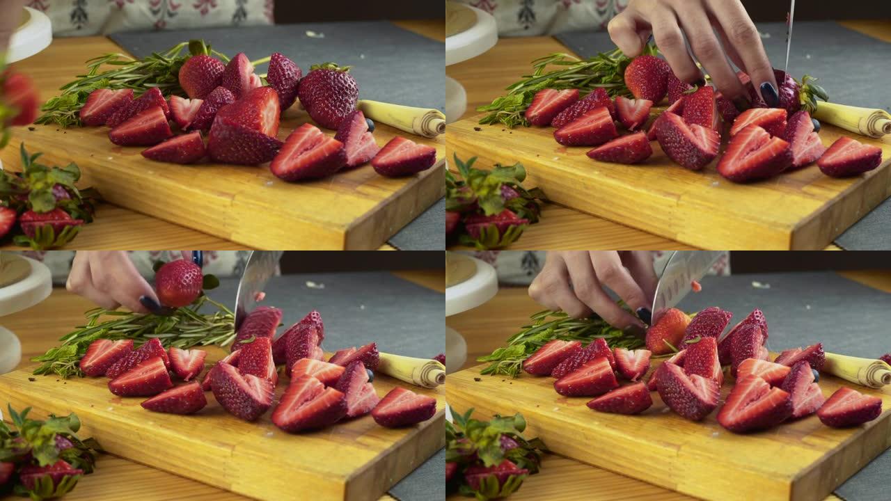 女人的手切割和切片草莓的特写