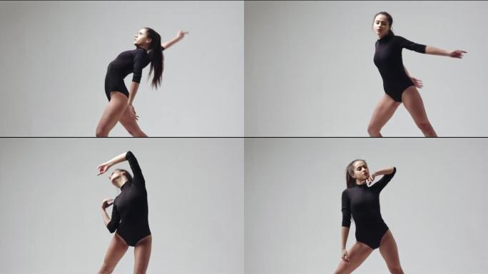漂亮的年轻芭蕾舞演员在演播室表演不同动作的视频剪辑。慢动作