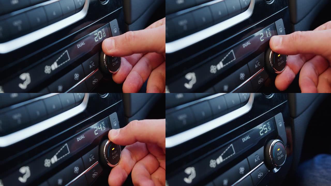 在车内设置空调。手转动空调环。显示屏指示车内温度。车内的冷却空气