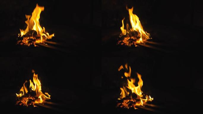 在炉子里生火。铁匠在炉子里锻炼钢铁产品。用于硬化和加热熨斗的铁匠铺锻造。铁匠炉。慢动作。