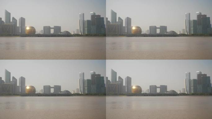 晴天时间杭州市著名的市中心现代建筑河畔湾慢动作全景4k中国